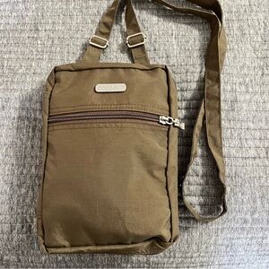 Baggallini crossbody travel bag, taupe/light brown with light blue lining.